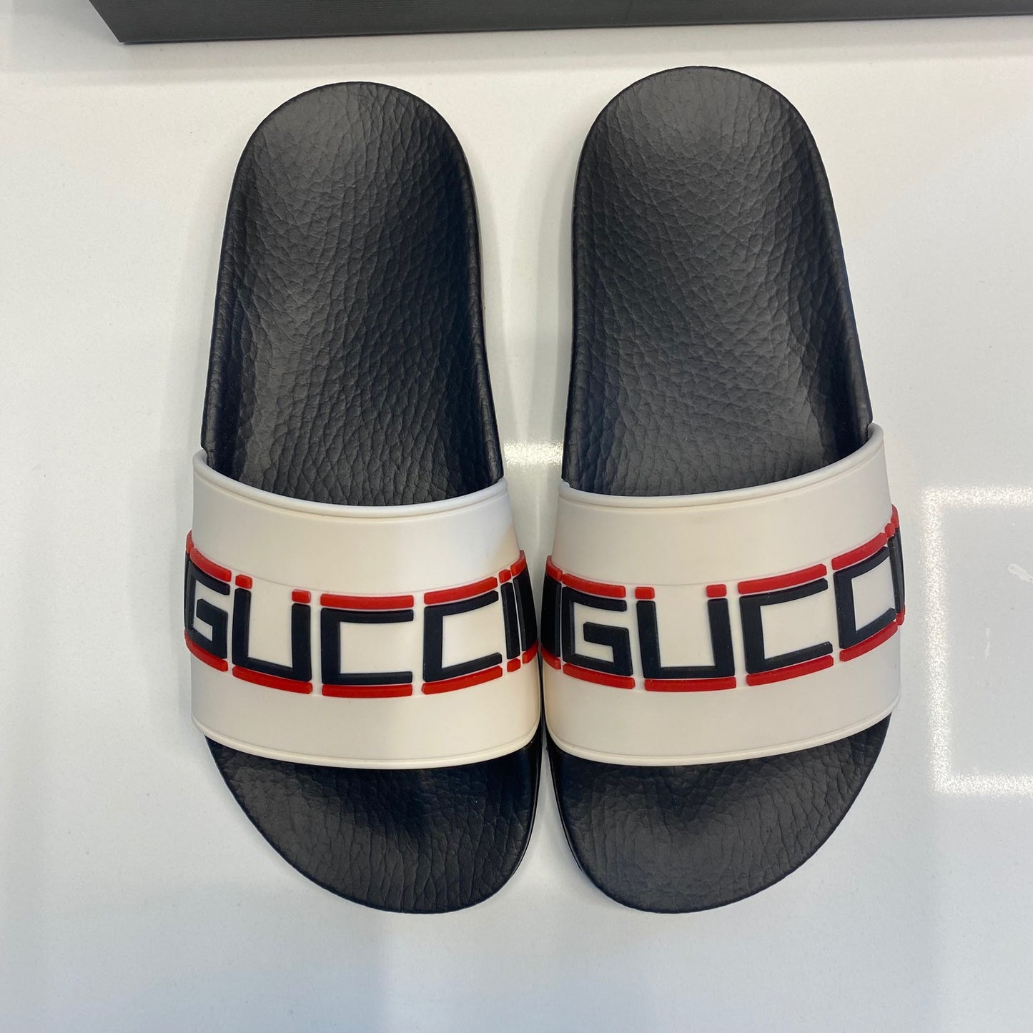 Gucci: Pursuit Rubber Slides