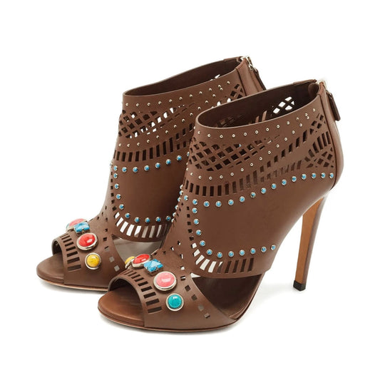 Stush Fashionista Gucci Lika brown calfskin ankle booties with laser-cut details, colorful jewels, and studs.