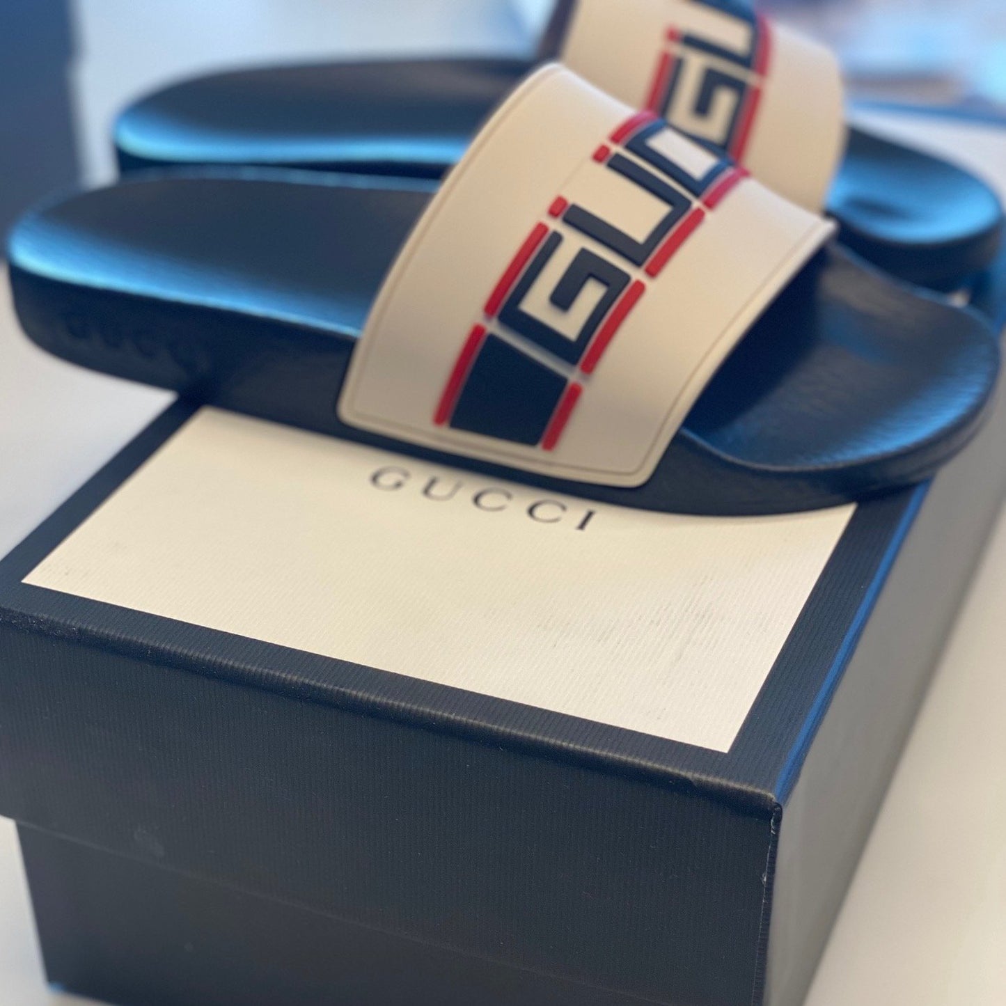 Gucci: Pursuit Rubber Slides