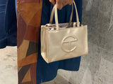 Telfar: Gold Shopping Bag (3 Sizes)